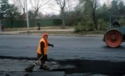 Woman%20paving%20street (thumbnail)