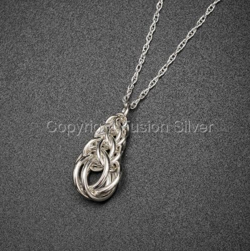 Jewelry-Lockets & Pendants-Graduated Full Persion Sterling Silver Pendant