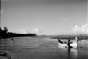 Fisherman%20pushing%20sampan%201950s (thumbnail)