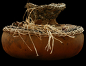 Decorative-gourd squashed with woven top