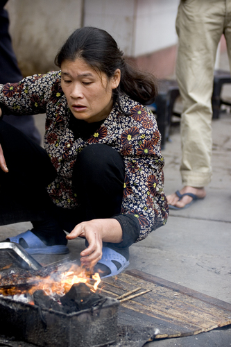 Photography-coal cooking on street