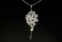 PIERCED%20%2C%20ENGRAVED%20WITH%20BLUE%20TOPAZ (thumbnail)