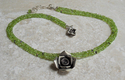 Faceted%20PERIDOT%20and%20Fine%20Silver%20Flower%20Pendant (thumbnail)