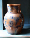Exuberantly Decorated Stoneware Pitcher