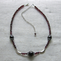 garnet , sterling, and fine silver necklace