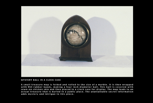 MYSTERY BALL, IN CLOCK CASE