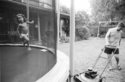 photo, photography, black and white photography, laura straus, laura, straus, children, playing, lawn, summer, summertime, family, chores, black and white, texas, playing -  Photography