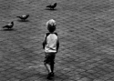 Photography--Black & White-PhotojournalismBoy with pigeons