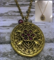 Garnet%20Glass%20Filigree%20Locket (thumbnail)