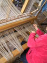 Fiber Art--Wall HangingTensioning warp threads.