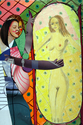 Woman At Mirror