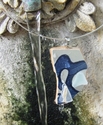 Jewelry--Found ObjectsPottery Shard with White Sea Glass and Pearl.