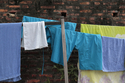 Blue clothes on a wall / Luang Phrabang / Laos / 2011 / pic154582