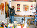 Morag painting in her studio