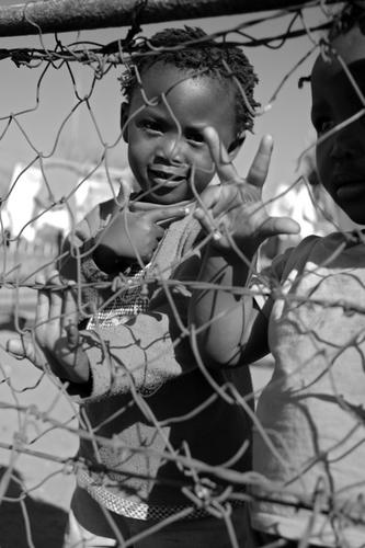 Photography-Children Behind a Fence