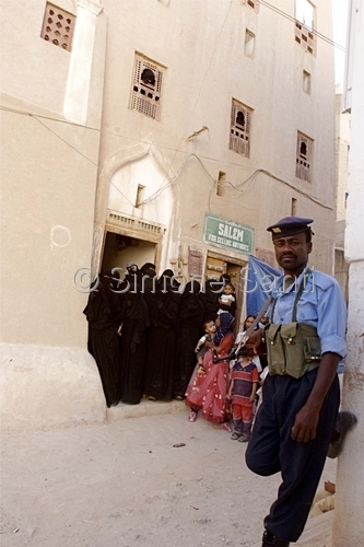 Photography-Soldier and women, Shibam