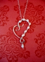 Scroll%20Heart%20Necklace%20with%20Wire-Wrapped%20Pearls (thumbnail)