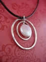Floating%20%20Sterling%20Circles%20on%20Leather%20with%20Coin%20Pearl (thumbnail)