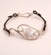 Jewelry--Noble Metals-Rings and BraceletsSterling Scroll Bracelet on leather