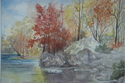 fall colors on the river bank
