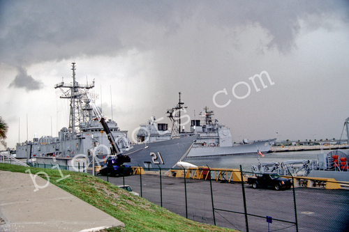 Scud clouds over vavel vessels with rain shaft